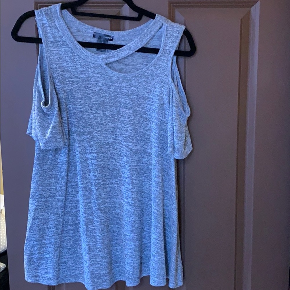 Grey tee lightly worn.